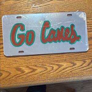 Mirrored 'Go Canes' License Plate